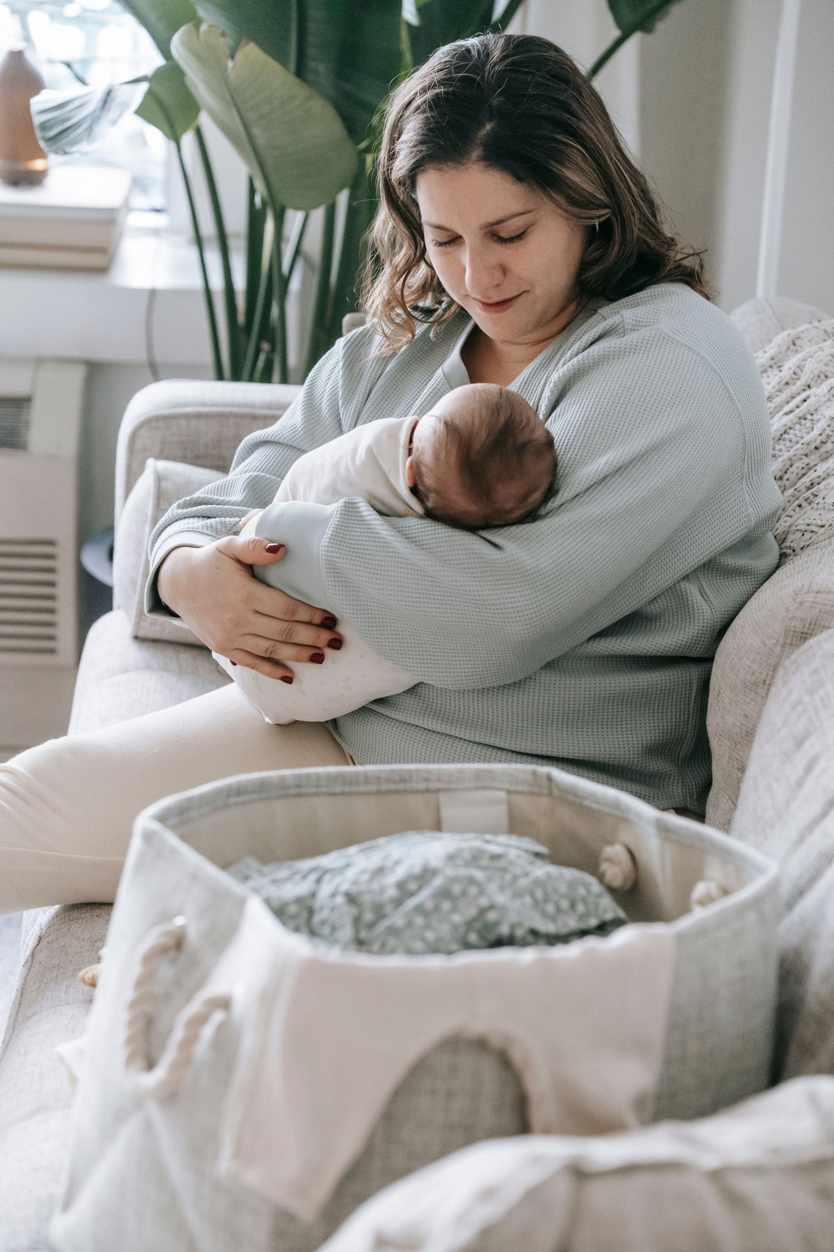 New mother resting at home — postpartum recovery meal support San Diego